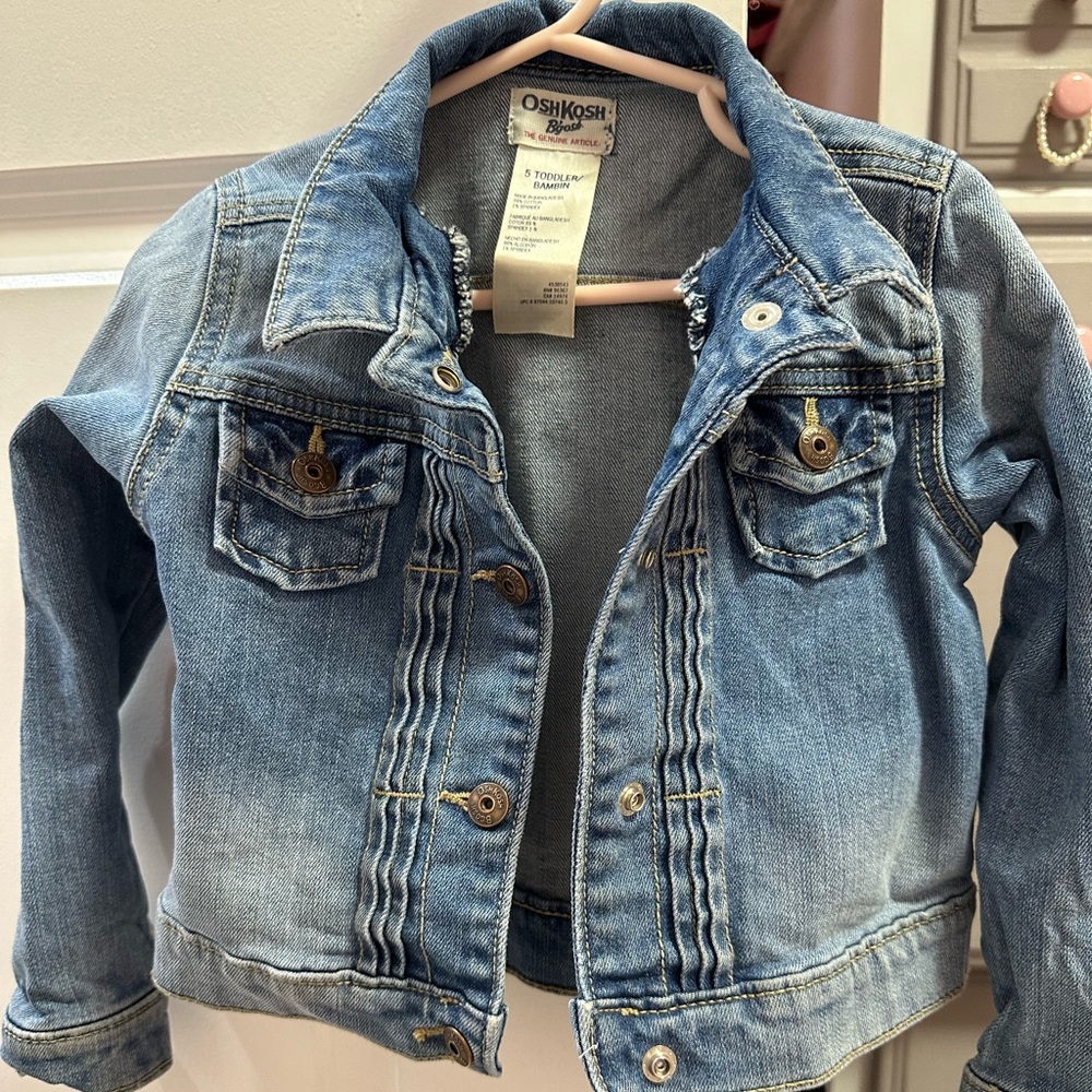 OshKosh denim jean jacked with cute pleats. Size 5.